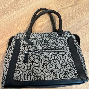 Grey and black hand bag brand